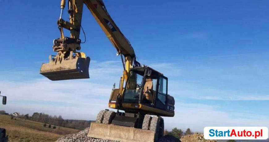 caterpillar-cat-m312-koparka-kolowa-bandrow-narodowy-539289518-1