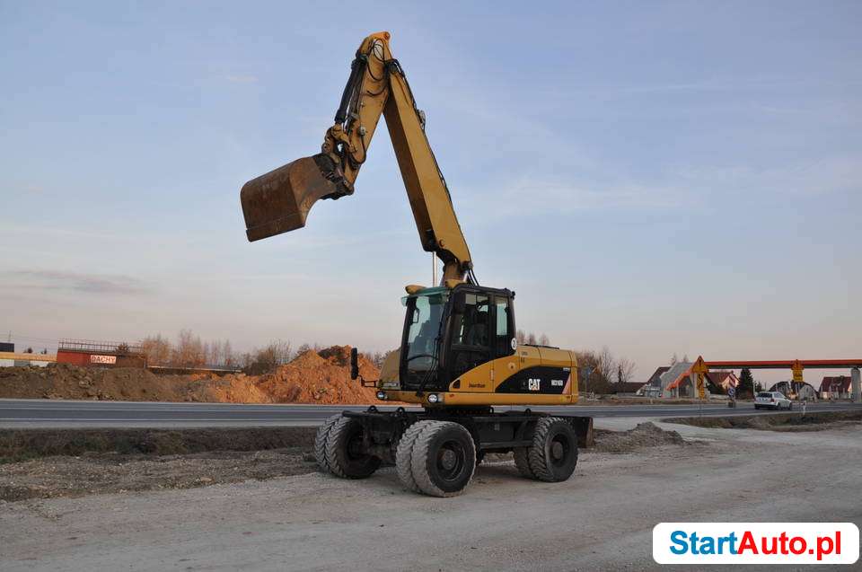 caterpillar-koparka-kolowa-obrotowa-cat-bilcza-528327988