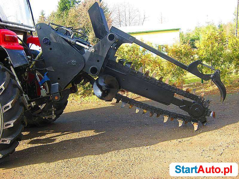 koparki-lancuchowe-napedzane-z-ciagnika-399468872
